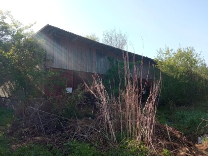 Львівська обл., м. Миколаїв, вул. Хмельницького Б, 2Б. Оренда –  приміщення будівлі гаражів площею 206,00 кв. м. (В)